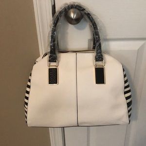 White and black handbag